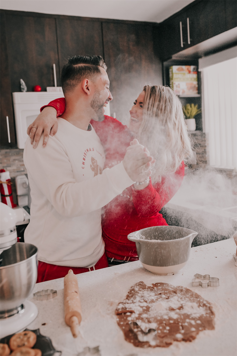 couple baking Christmas treats