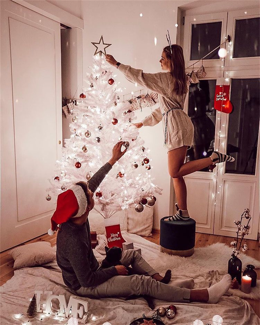 couple photo decorating the Christmas tree