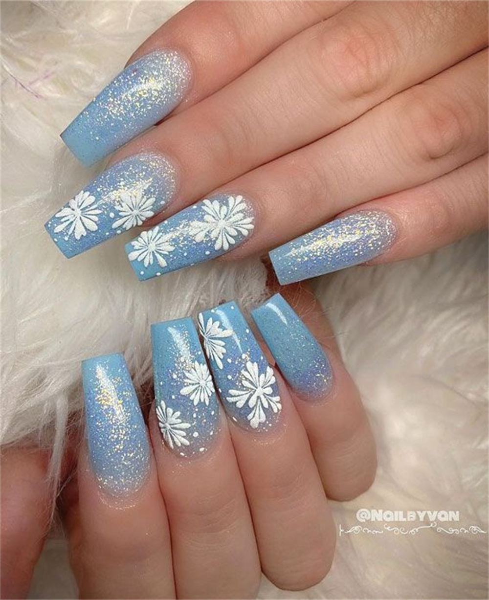 Christmas nails with an icy blue glitter gradient