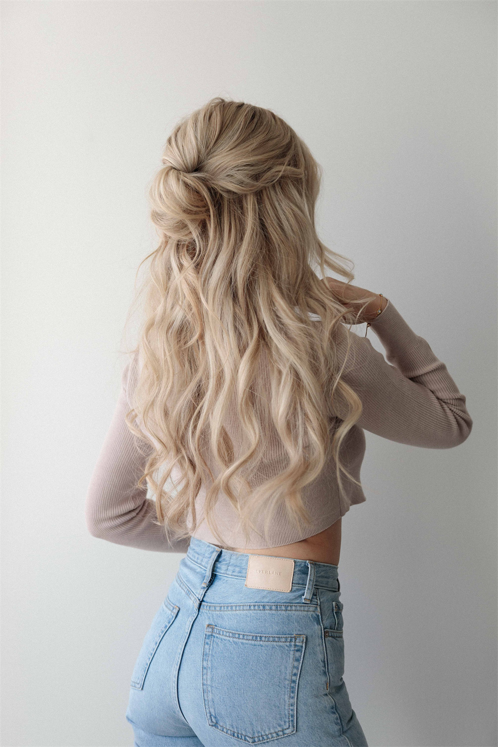 Half-Up Knot half up half down hairstyles for long hair